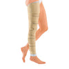 Beige Circaid Juxtalite Full Leg on a person's leg against a white background