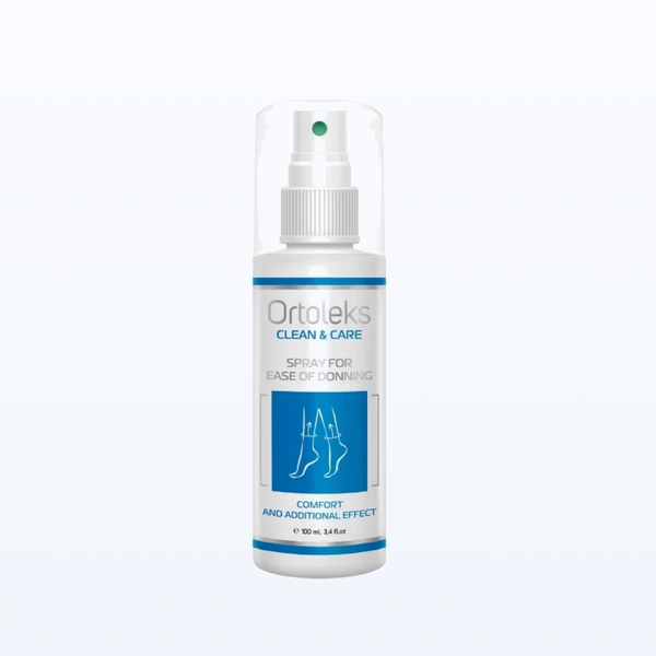 A white plastic spray bottle of Ortolek Clean & Care spray for ease of donning, featuring a blue and white label with a graphic of crossed legs, set against a plain white background.